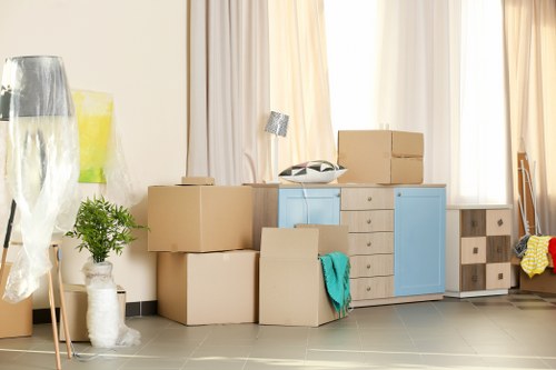 Commercial moving team preparing office equipment for relocation in Southgate