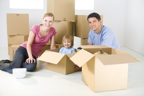 Removal team planning a Southgate home move with boxes and furniture