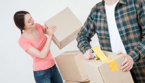 Van removal team preparing equipment safely before a move