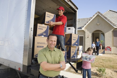 Man With A Van Southgate pricing introduction with moving van and packed boxes