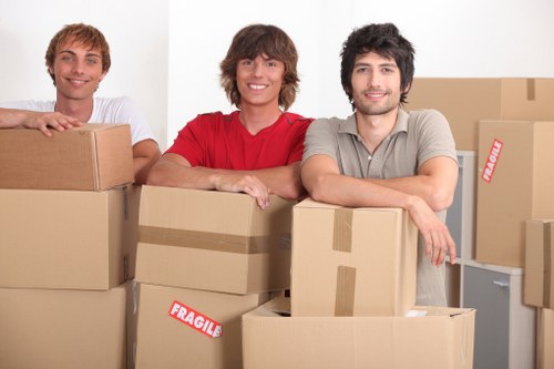 Southgate house move with helpers carrying boxes and furniture