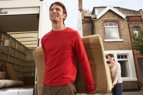 Unpacking household items in a Southgate property