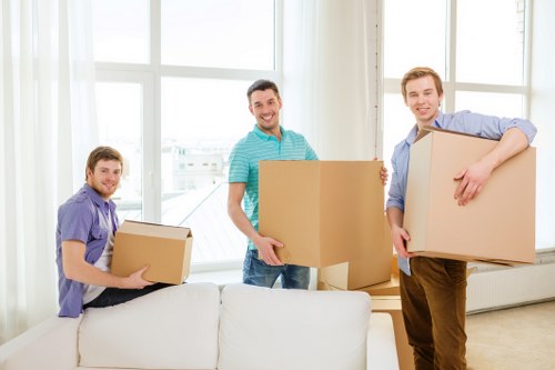 Removalists unloading household items into a Southgate property