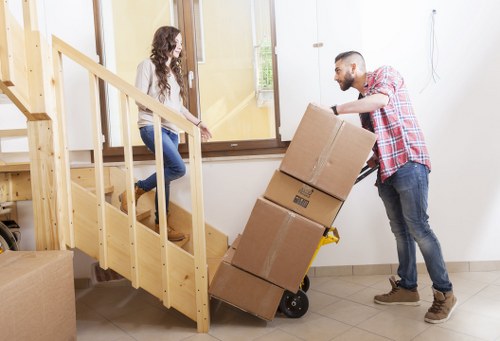 Local removals team loading items into a van in Southgate