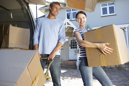 Loading furniture into a van for a Southgate house move